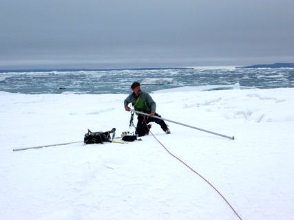 A man working in the snow.
