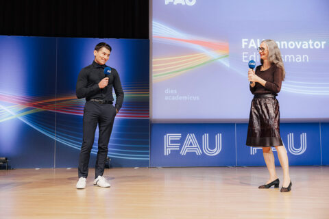 The FAU Dies Academicus 2025: FAU innovator Ediz Osman and VP Education Andrea Bréard. (Image: FAU/Giulia Iannicelli)
